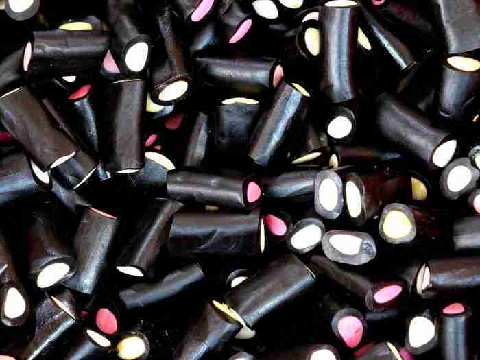 licorice candy sweets background e1620834234107